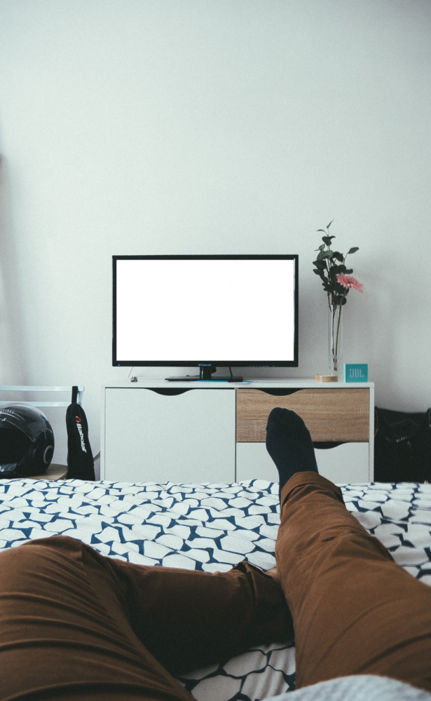 Desktop Mockup: man watching a movie