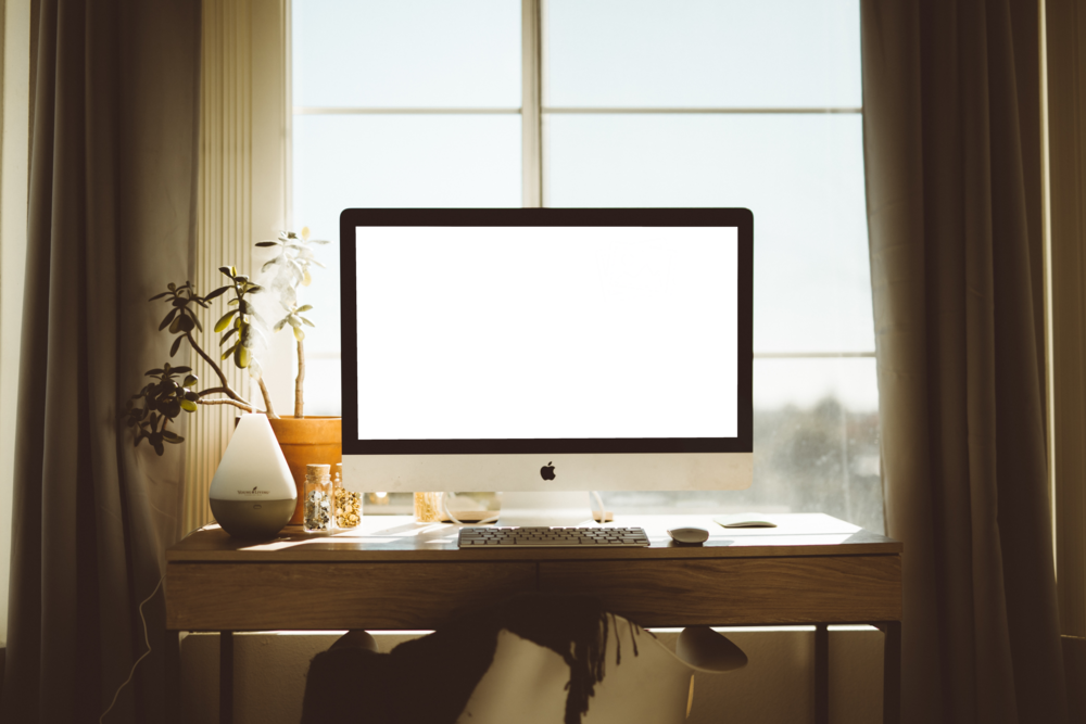 Desktop Mockup: desktop pc near the window in brown background