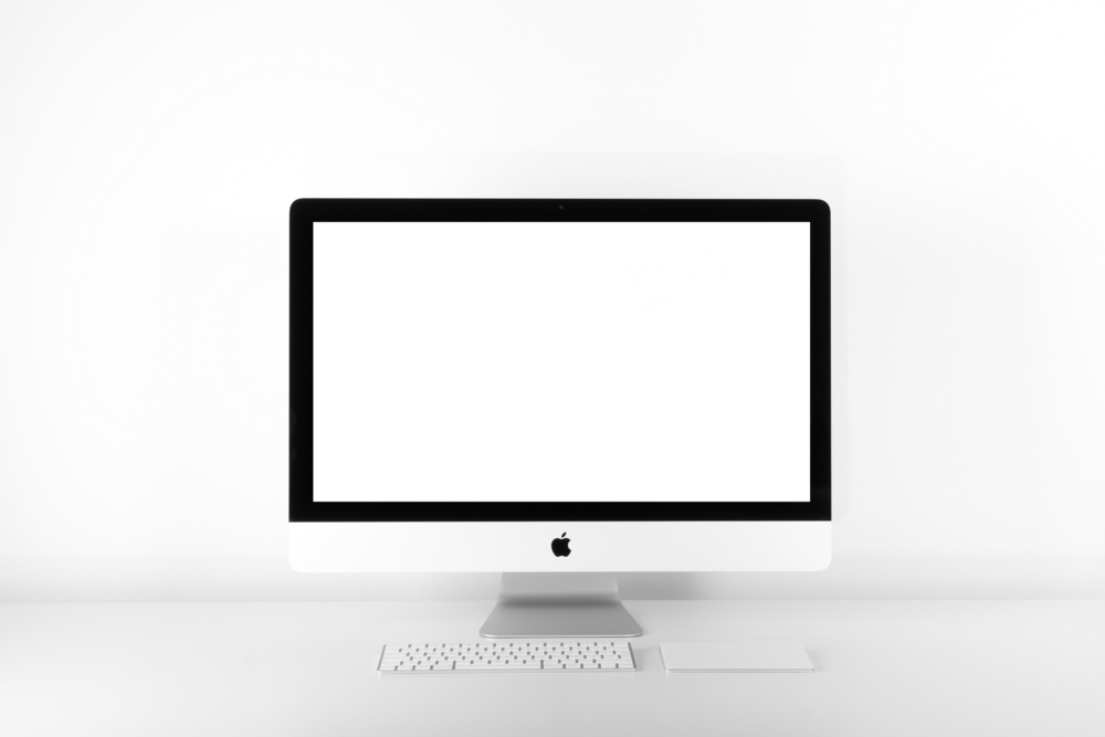 Desktop Mockup: plain i mac on the table