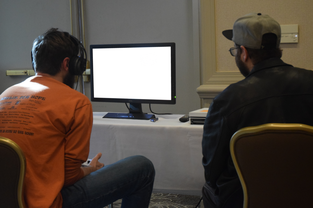 Desktop Mockup: two men are playing games