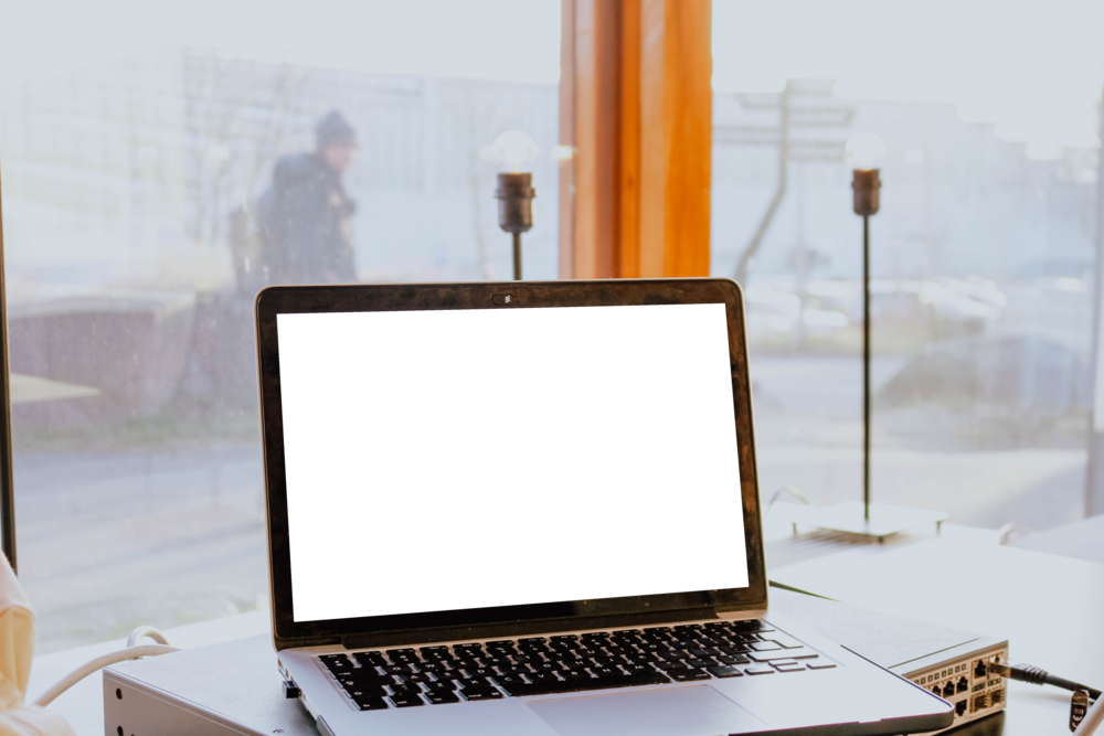 Laptop Mockup: laptop near the rainy window