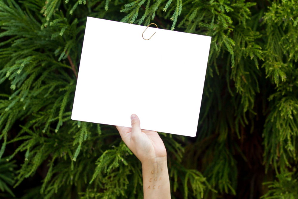 Space Mockup: person holding poster