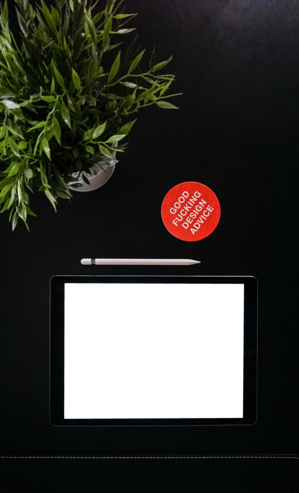 Tablet Mockup: ipad on dark desk near the plant