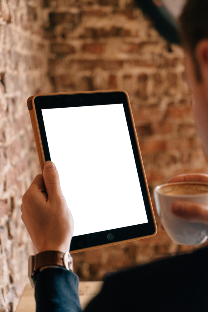 Tablet Mockup: ipad reading in a coffee shop