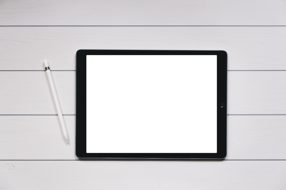 Tablet Mockup: table on the wooden floor